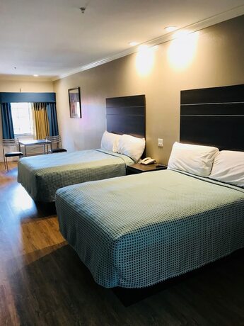 Imagen de la habitación del Hotel Palace Inn Greenspoint. Foto 15