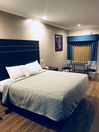 Imagen de la habitación del Hotel Palace Inn Greenspoint. Foto 18