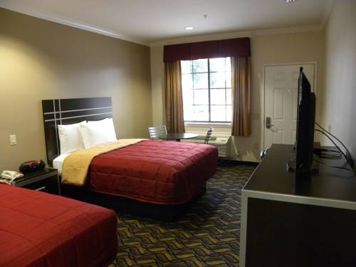 Imagen de la habitación del Hotel Palace Inn Kingwood. Foto 10