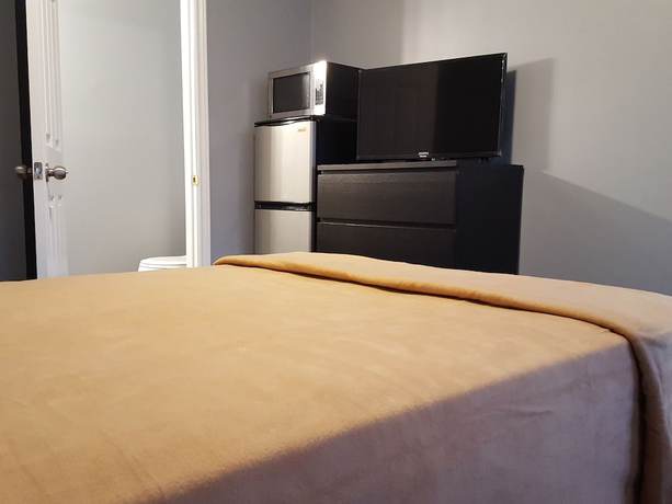 Imagen de la habitación del Hotel Palace Inn Motel. Foto 6