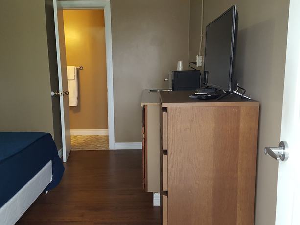 Imagen de la habitación del Hotel Palace Inn Motel. Foto 10