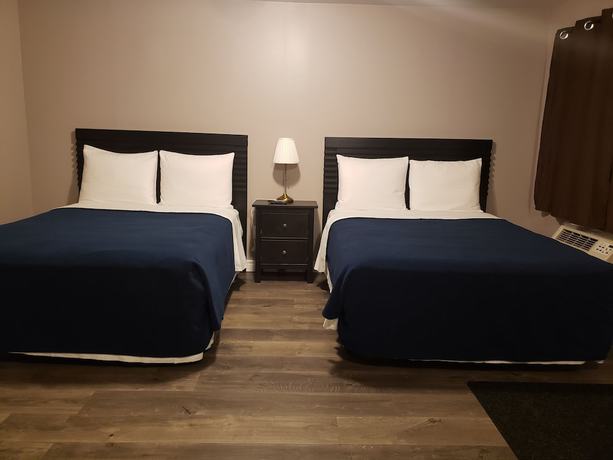 Imagen de la habitación del Hotel Palace Inn Motel. Foto 12