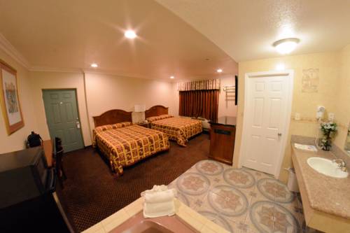Imagen de la habitación del Hotel Palace Inn Oxnard. Foto 2