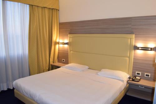 Imagen de la habitación del Hotel Palace Inn Rome Fiano. Foto 12