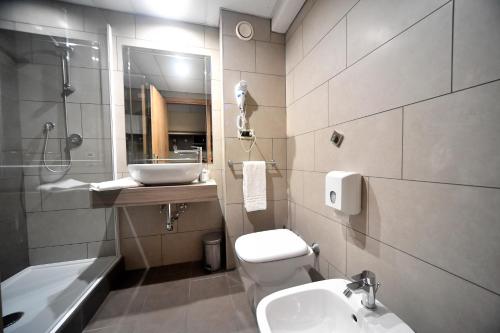 Imagen de la habitación del Hotel Palace Inn Rome Fiano. Foto 16