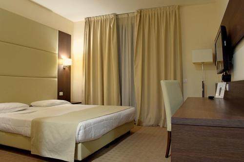 Imagen de la habitación del Hotel Palace Inn Rome Fiano. Foto 18