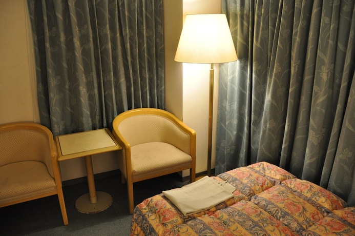 Imagen de la habitación del Hotel Palace Inn Toyota. Foto 3
