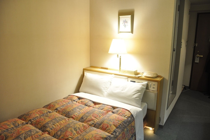 Imagen de la habitación del Hotel Palace Inn Toyota. Foto 6