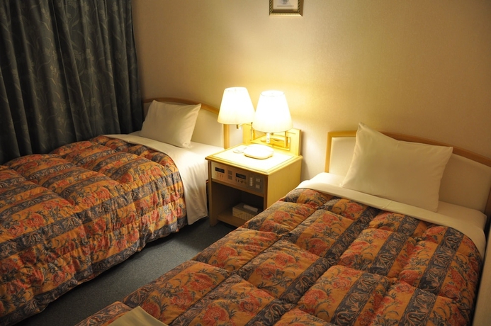 Imagen de la habitación del Hotel Palace Inn Toyota. Foto 9