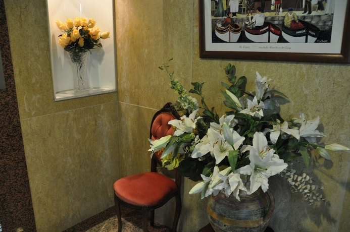 Imagen de los interiores del Hotel Palace Inn Toyota. Foto 14