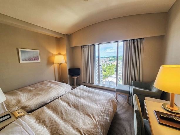 Imagen de la habitación del Hotel Palace KAKEGAWA. Foto 10