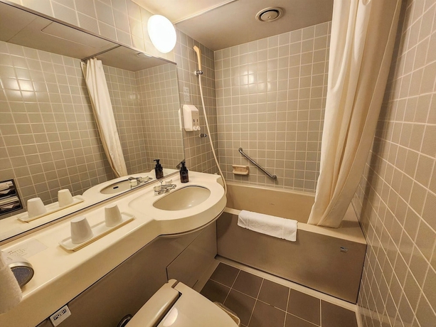 Imagen de la habitación del Hotel Palace KAKEGAWA. Foto 11