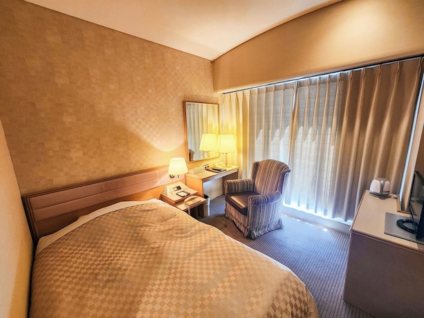 Imagen de la habitación del Hotel Palace KAKEGAWA. Foto 12
