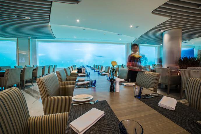 Imagen del bar/restaurante del Hotel Palace Resort Yalong Bay Sanya. Foto 2