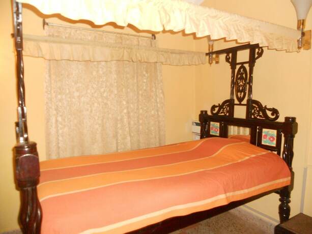 Imagen de la habitación del Hotel Palacete Rodrigues. Foto 18