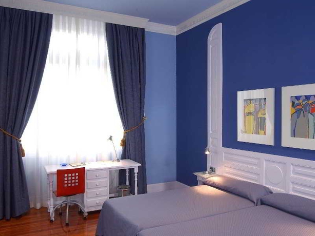 Imagen de la habitación del Hotel Palacete Villa Rosario. Foto 8