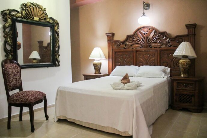 Imagen de la habitación del Hotel Palacio Canton. Foto 15