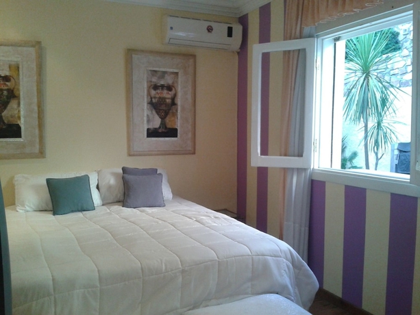 Imagen de la habitación del Hotel Palacio Escondido Departamentos Boutique. Foto 4