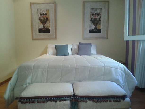 Imagen de la habitación del Hotel Palacio Escondido Departamentos Boutique. Foto 5