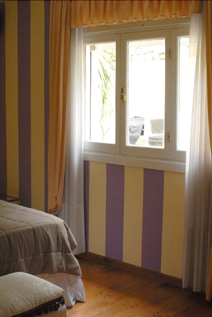 Imagen de la habitación del Hotel Palacio Escondido Departamentos Boutique. Foto 6