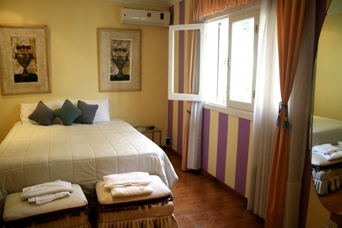 Imagen de la habitación del Hotel Palacio Escondido Departamentos Boutique. Foto 7