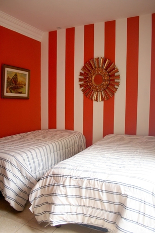 Imagen de la habitación del Hotel Palacio Escondido Departamentos Boutique. Foto 10