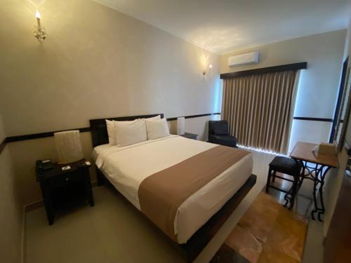 Imagen de la habitación del Hotel Palacio Maya, M&eacute;rida. Foto 17