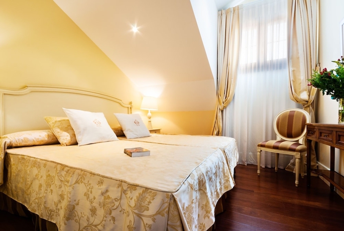 Imagen de la habitación del Hotel Palacio Villa de Alarc&oacute;n. Foto 7
