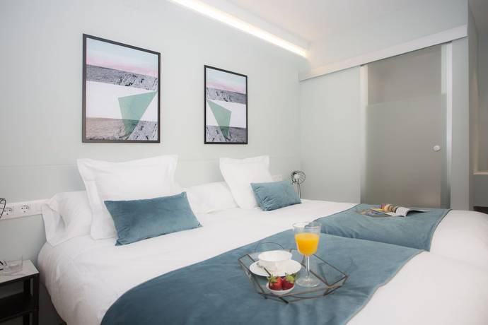 Imagen de la habitación del Hotel Palacios Rooms by SingularStays. Foto 3