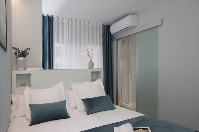 Imagen de la habitación del Hotel Palacios Rooms by SingularStays. Foto 10