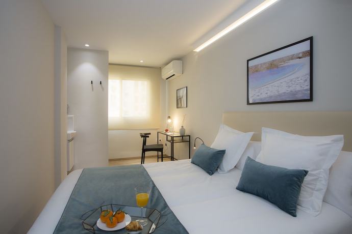 Imagen de la habitación del Hotel Palacios Rooms by SingularStays. Foto 12