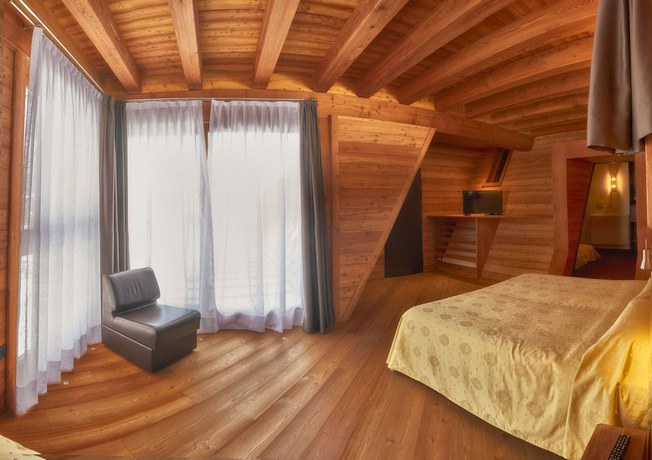 Imagen de la habitación del Hotel Paladin, San Martino di Castrozza. Foto 13