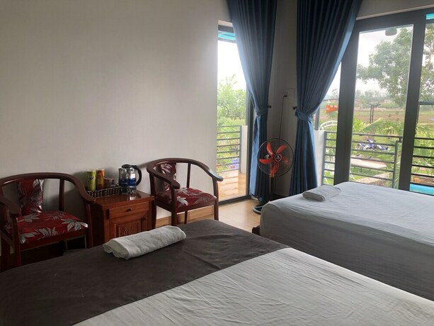 Imagen de la habitación del Hotel Palafita Bungalow. Foto 31