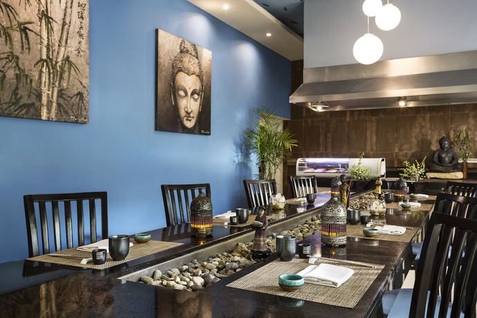 Imagen del bar/restaurante del Hotel Palafitos Overwater Bungalows at El Dorado Maroma by Karisma. Foto 5