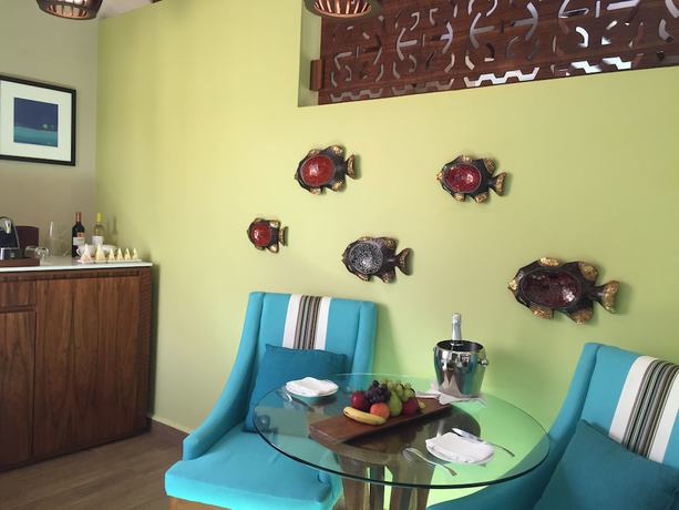 Imagen de la habitación del Hotel Palafitos Overwater Bungalows at El Dorado Maroma by Karisma. Foto 16