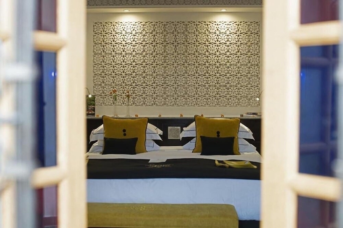 Imagen de la habitación del Hotel Palais Amani. Foto 10