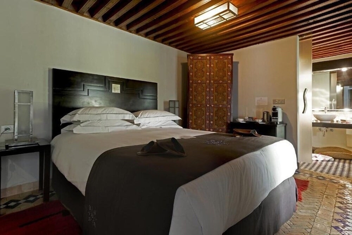 Imagen de la habitación del Hotel Palais Amani. Foto 13