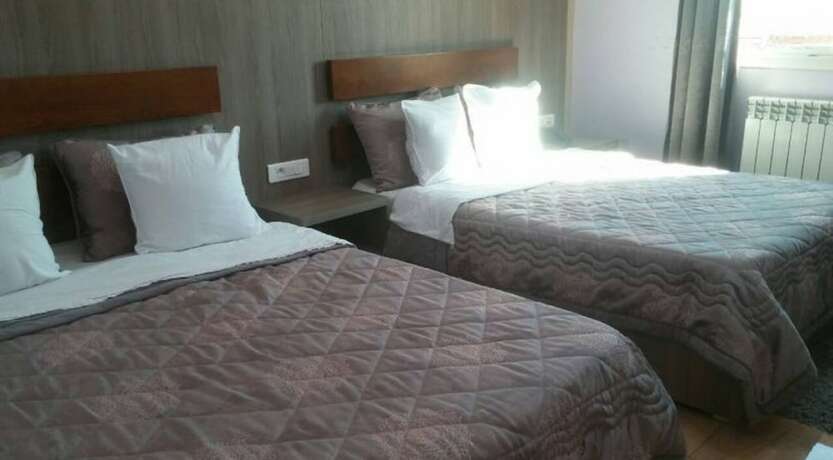 Imagen de la habitación del Hotel Palais Familial. Foto 19