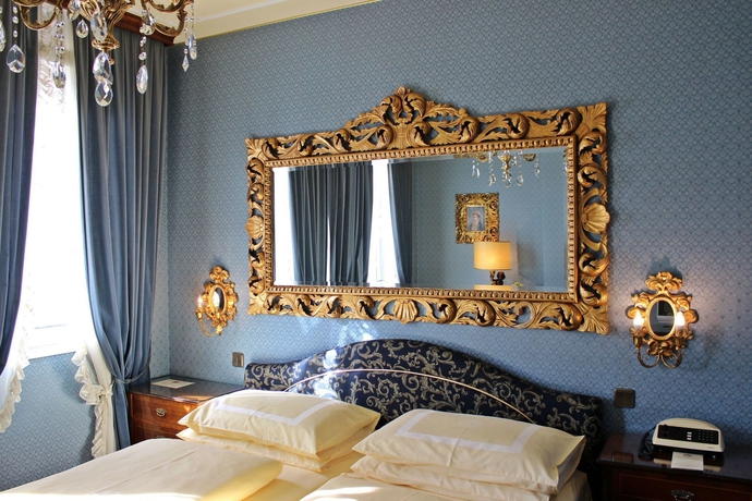 Imagen de la habitación del Hotel Palais Porcia. Foto 4