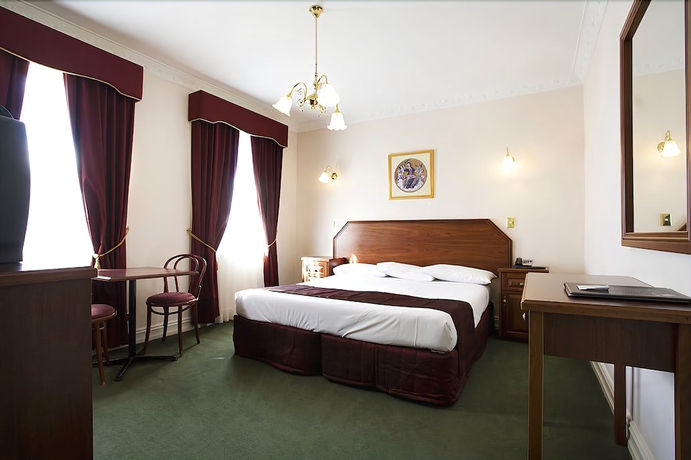 Imagen de la habitación del Hotel Palais Royale. Foto 12