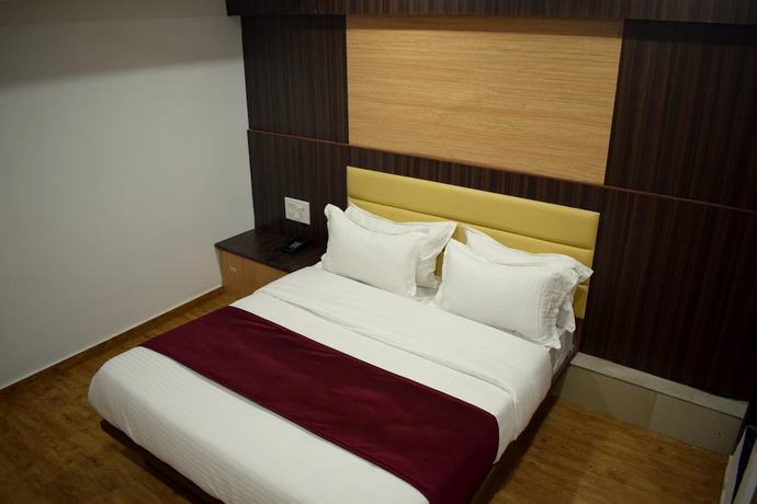 Imagen de la habitación del Hotel Palak Palace. Foto 6