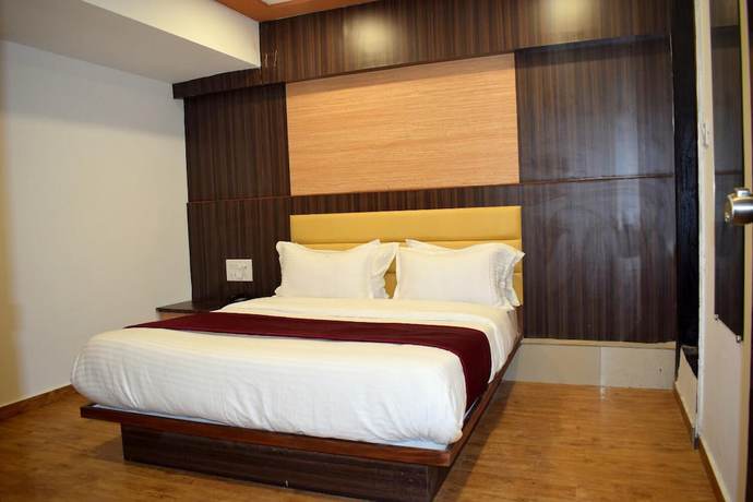 Imagen de la habitación del Hotel Palak Palace. Foto 7