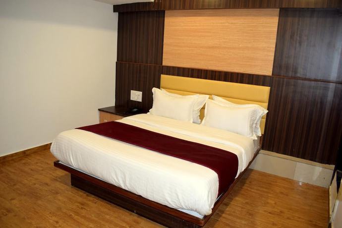 Imagen de la habitación del Hotel Palak Palace. Foto 11