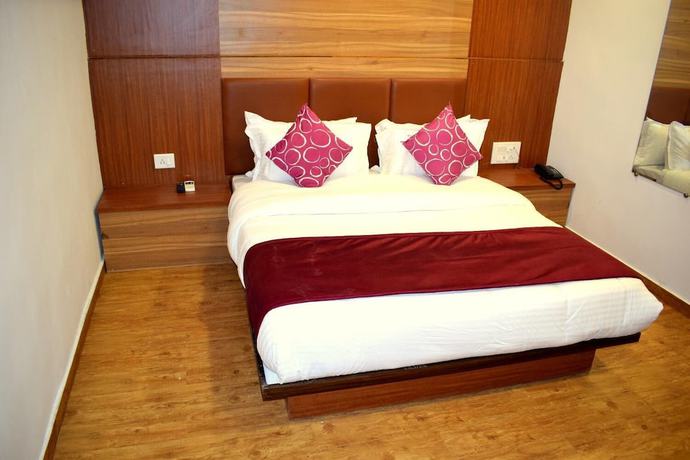 Imagen de la habitación del Hotel Palak Palace. Foto 15