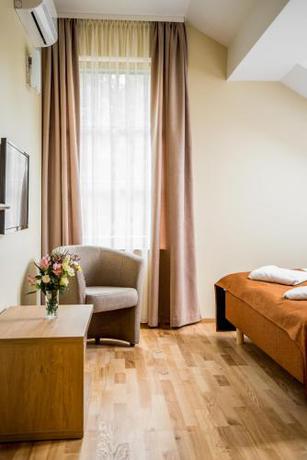 Imagen de la habitación del Hotel Palanga Camping Compensa. Foto 11