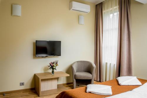 Imagen de la habitación del Hotel Palanga Camping Compensa. Foto 12