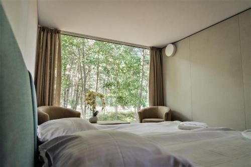 Imagen de la habitación del Hotel Palanga Camping Compensa. Foto 15