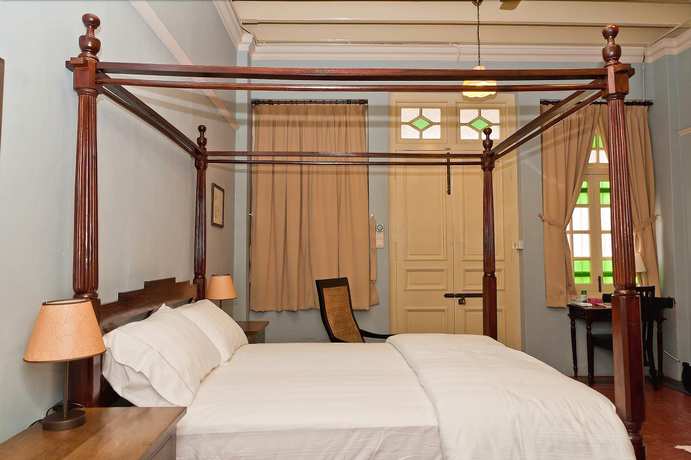Imagen de la habitación del Hotel Palanquinn Heritage Suites. Foto 18