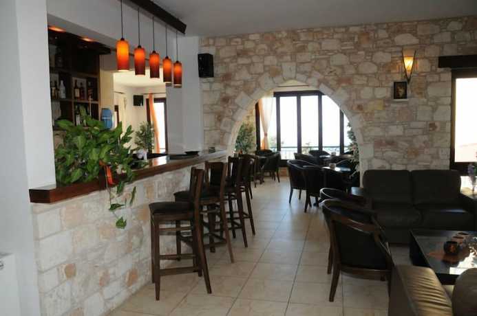 Imagen del bar/restaurante del Hotel Palates Village. Foto 3