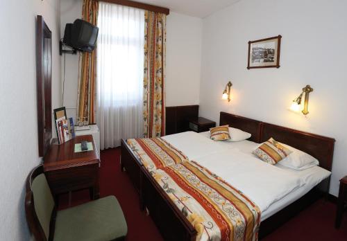 Imagen de la habitación del Hotel Palatinus Grand. Foto 6